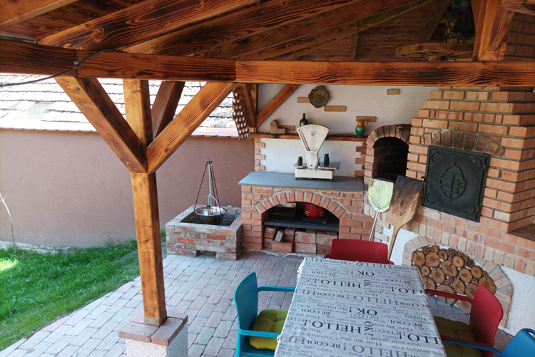 Magnólia Apartman - Sütögető terasz